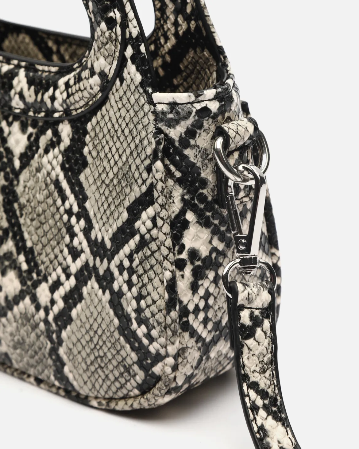 Bolso de fiesta animal print con asa bandolera extraíble